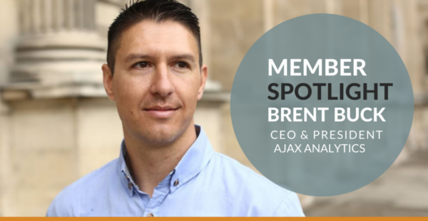 image_55.normal Brent is President & CEO of Ajax Analytics and member at desk chair workspace.